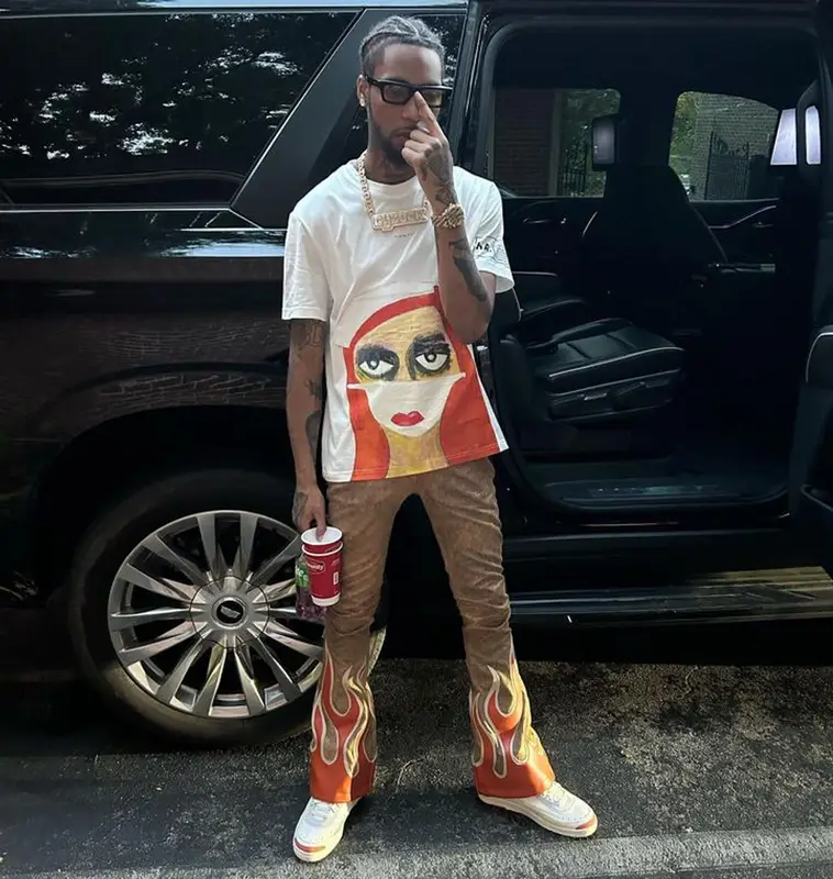 Key Glock outfit in Jordan, Prada, and Maison Chateau, 2023
