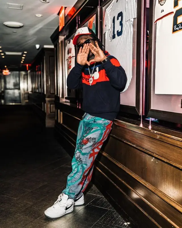 Lil Uzi Vert outfit in Nike, Ferragamo, and Skoloct, 2023