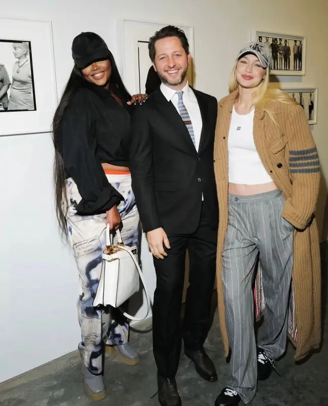 Gigi Hadid outfit in Thom Browne, Givenchy, and Calvin Klein, 2023