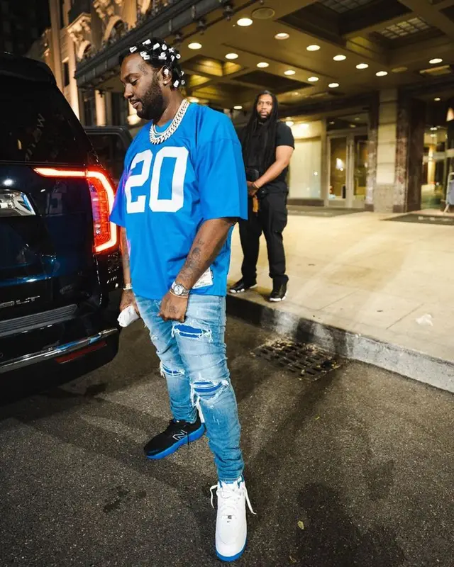 Peezy outfit in Mitchell & Ness, Amiri, and Versace, 2023