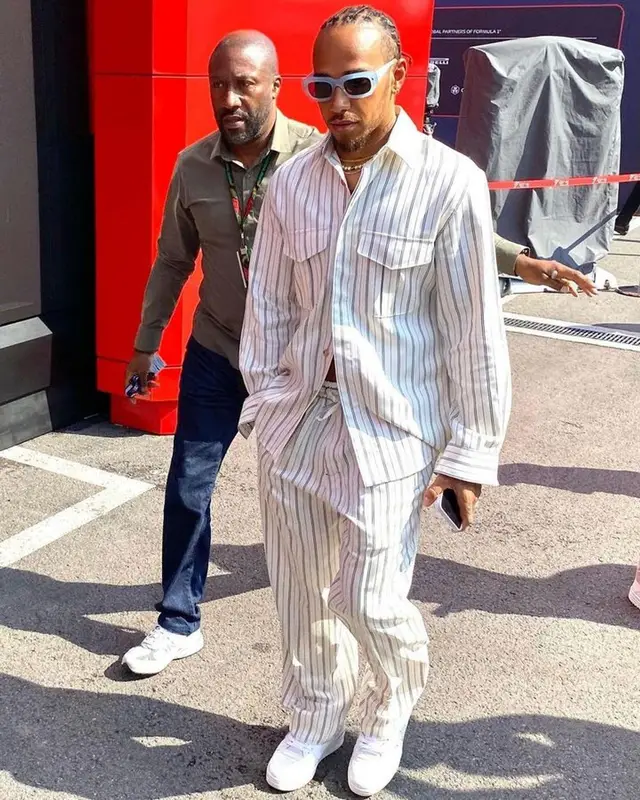 Lewis Hamilton outfit in Umit Benan, Prada, and Nanushka, 2023