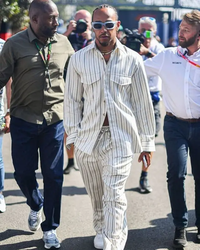 Lewis Hamilton outfit in Umit Benan, Prada, and Nanushka, 2023
