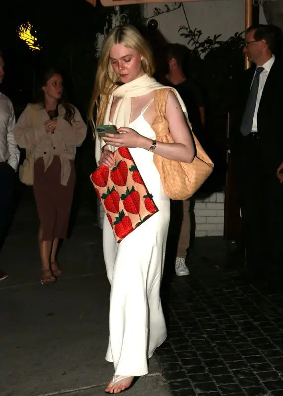 Elle Fanning outfit in Cartier, Bottega Veneta, and The Row, 2023