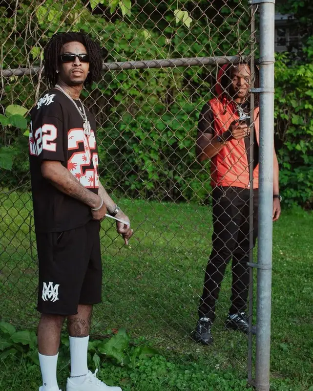 21 Savage outfit in Amiri, Nike, and Prada, 2023