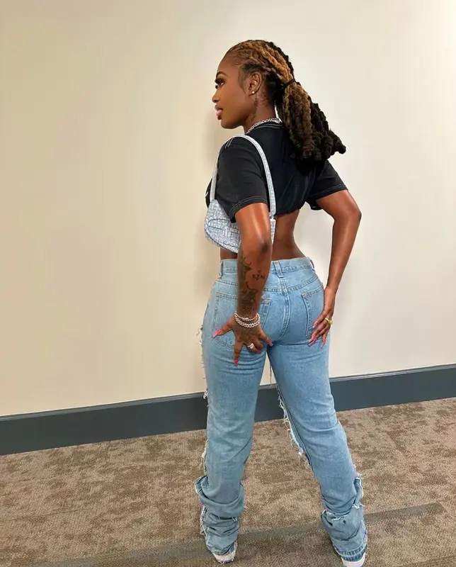 kaliii outfit in BooHooMan, Nike, and Diesel, 2023