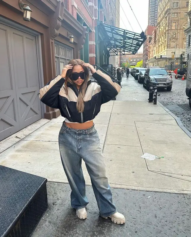Jordyn Woods outfit in Mugler, Prada, and Gucci, 2023
