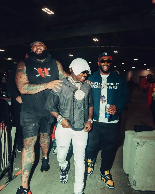 DaBaby outfit in Champion, Amiri, and Prada, 2023