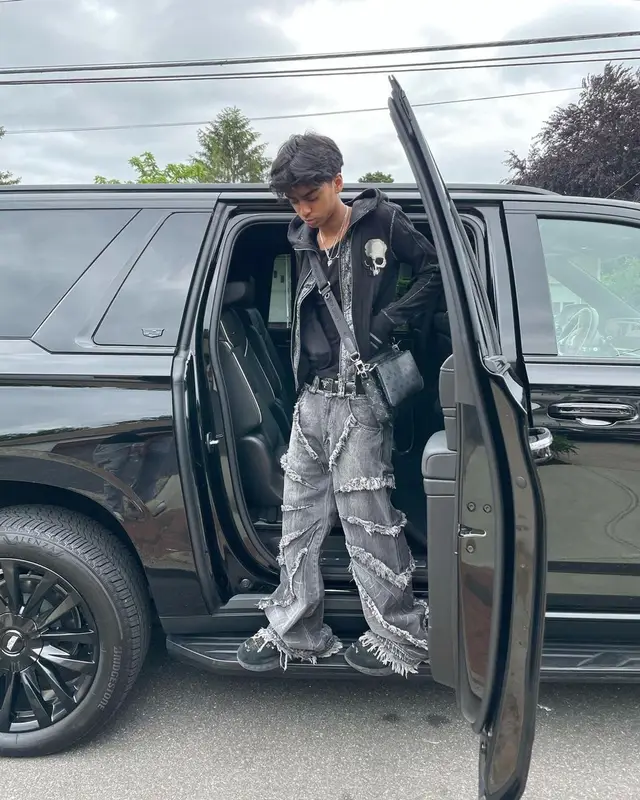 Yung Fazo outfit in Prada, Louis Vuitton, and Givenchy, 2023