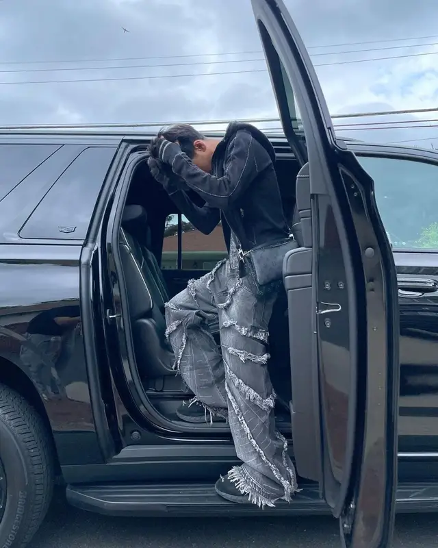 Yung Fazo outfit in Prada, Louis Vuitton, and Givenchy, 2023