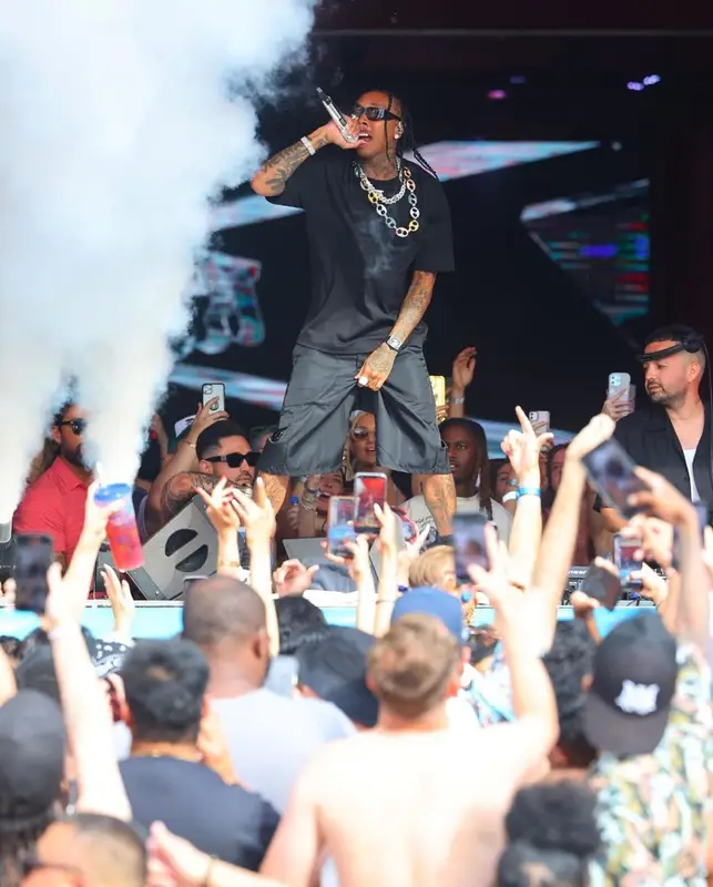 Tyga outfit in Vans, Prada, and Nike, 2023