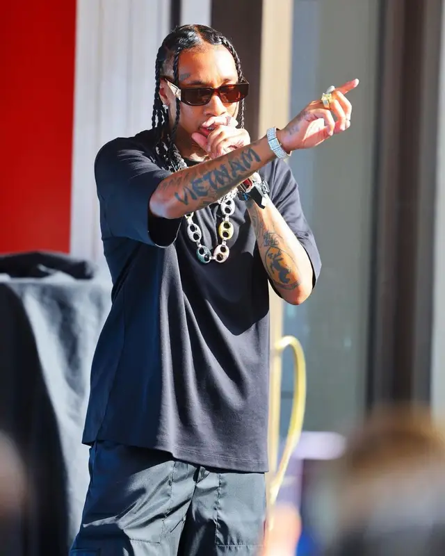 Tyga outfit in Vans, Prada, and Nike, 2023