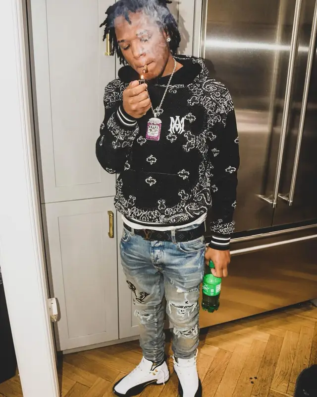 B Lovee outfit in Amiri, Jordan, and Louis Vuitton, 2021
