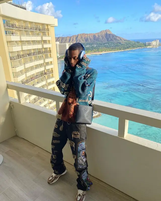 Yvngxchris outfit in Barriers, Vivienne Westwood, and Apple, 2022