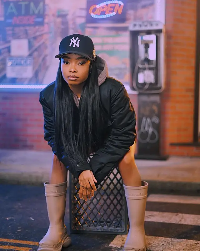 Lola Brooke outfit in Vetements, Skims, and New Era, 2023