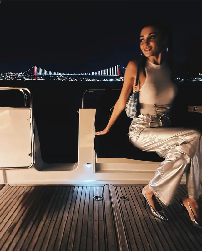 Hande Erchel outfit in Saint Laurent, Zara, and Dolce & Gabbana, 2023