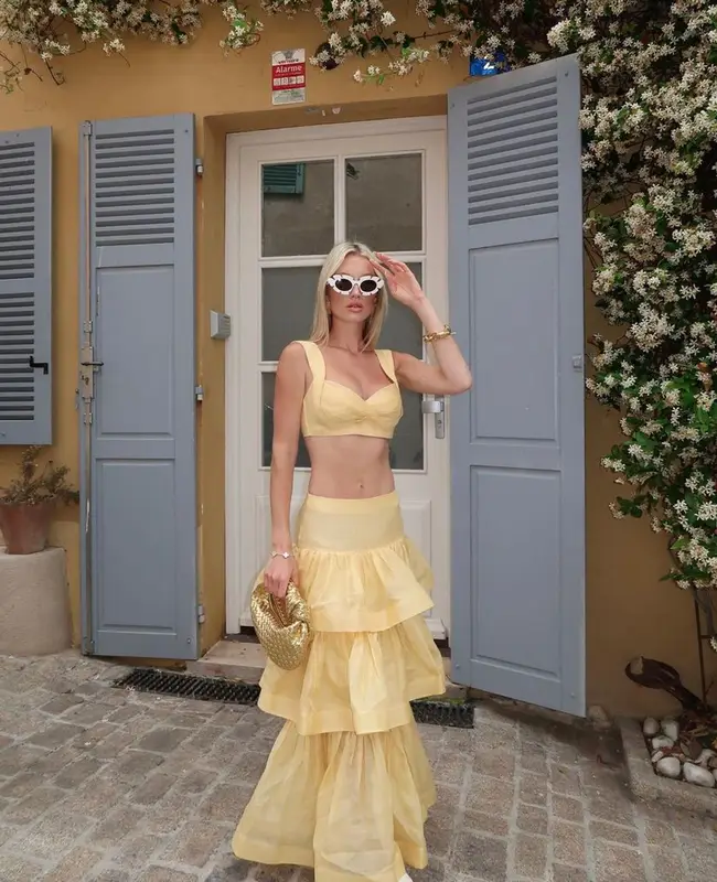 Meredith Duxbury outfit in Zimmermann, Bottega Veneta, and Loewe, 2023