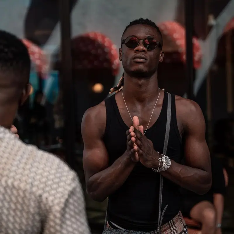 Eduardo Camavinga outfit in Burberry, Goyard, and Louis Vuitton, 2023