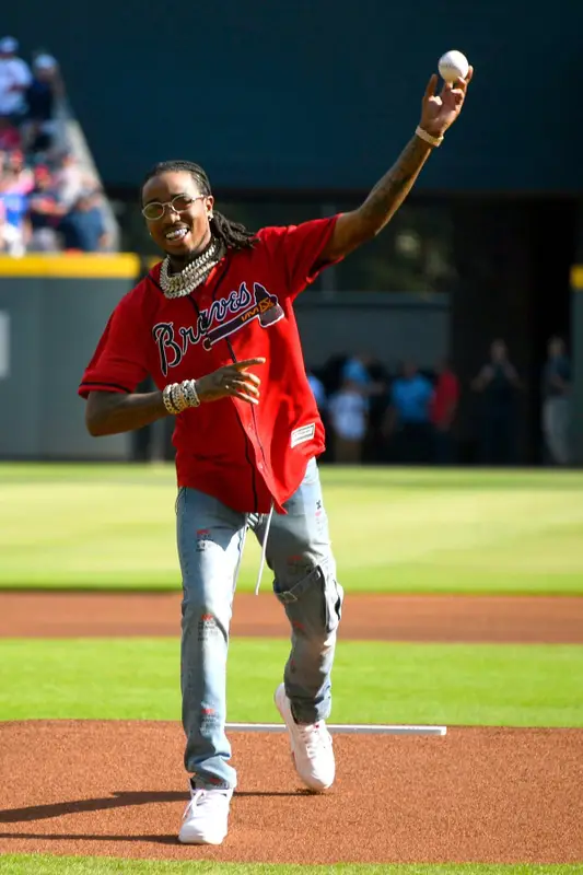 Quavo outfit in Nike, Cartier, and Rawlings, 2020