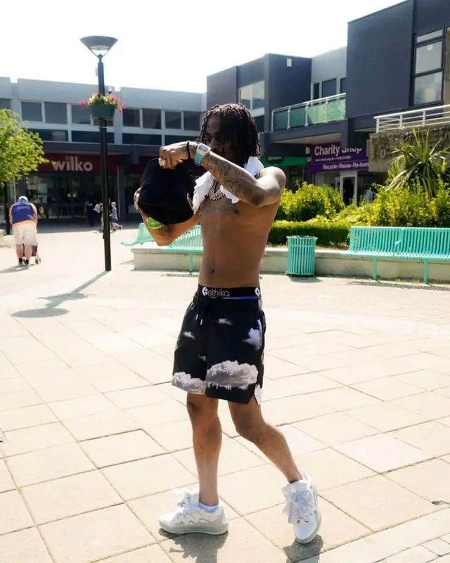 Russ Millions outfit in Jordan, Louis Vuitton, and Dolce & Gabbana, 2023