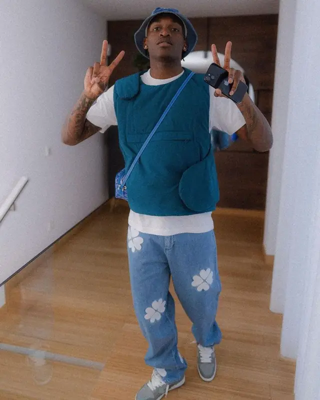 Rafael Leao outfit in Off-White, Goyard, and Marine Serre, 2023