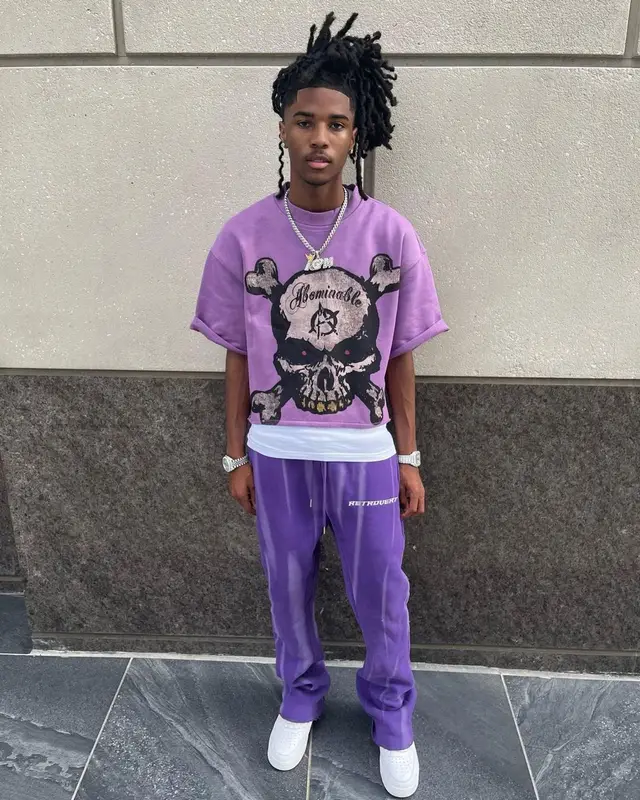Lil Darius outfit in Hanes, Luv Abominable, and Nike, 2023
