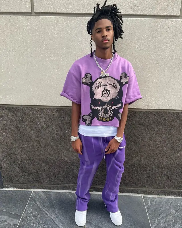 Lil Darius outfit in Hanes, Luv Abominable, and Nike, 2023
