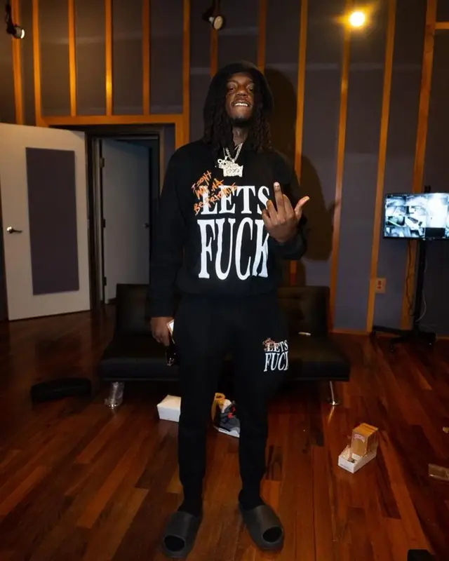 OMB Peezy outfit in Merlins Father, 2023