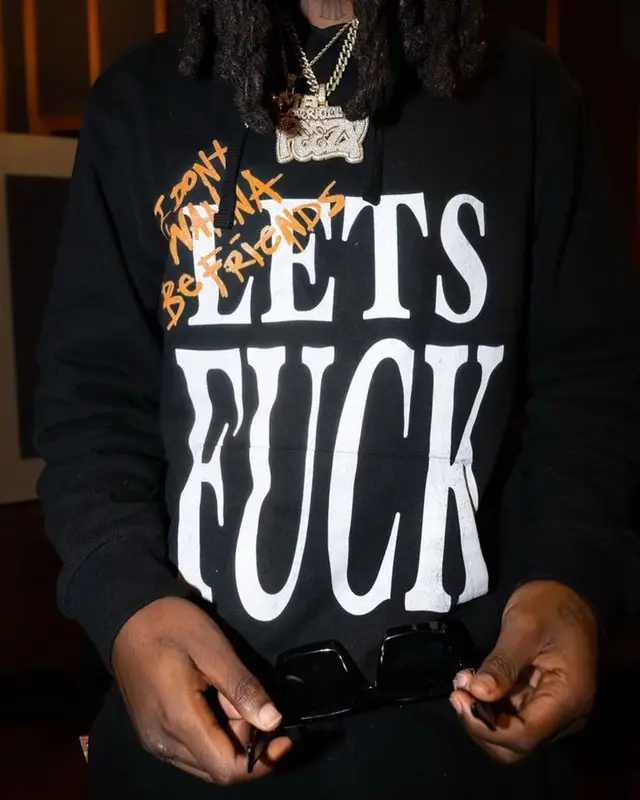 OMB Peezy outfit in Merlins Father, 2023