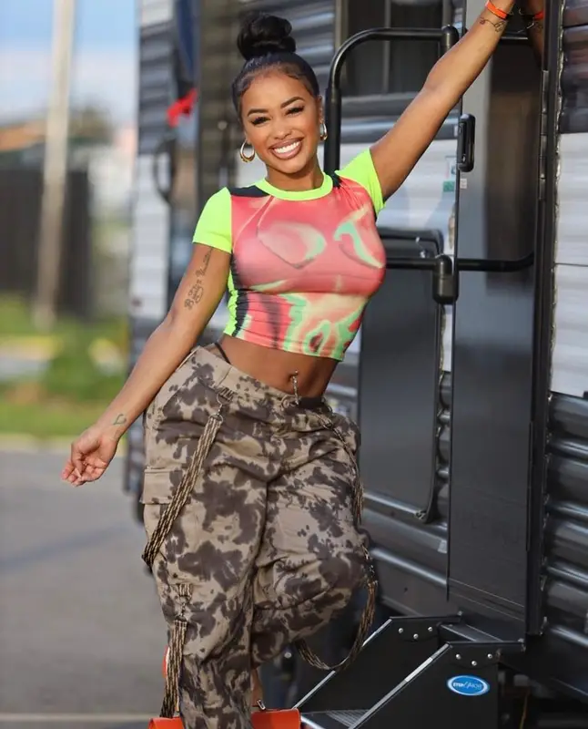 Dream Doll outfit in FashionNova, Goyard, and Bape, 2023