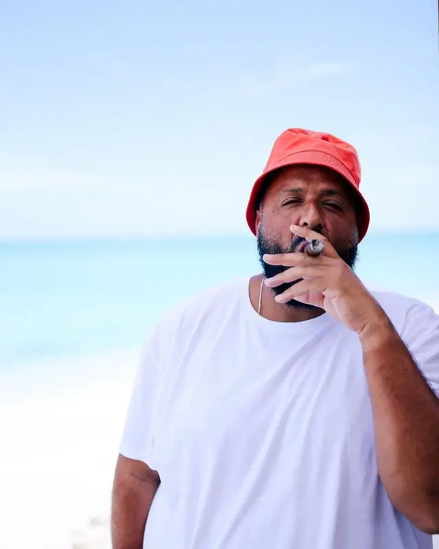 DJ Khaled outfit in Polo Ralph Lauren, Nike, and Prada, 2023