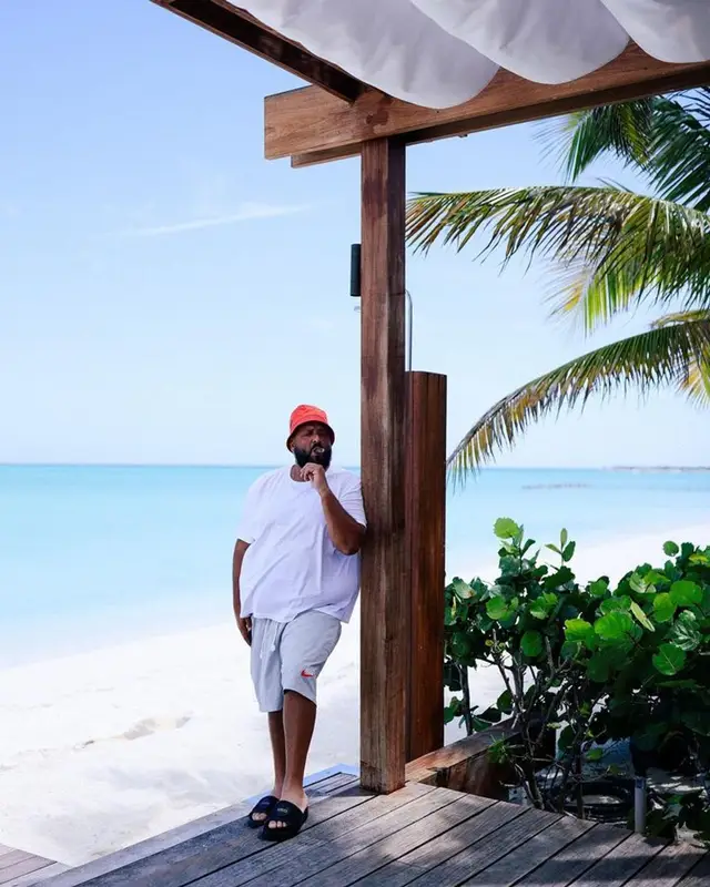 DJ Khaled outfit in Polo Ralph Lauren, Nike, and Prada, 2023