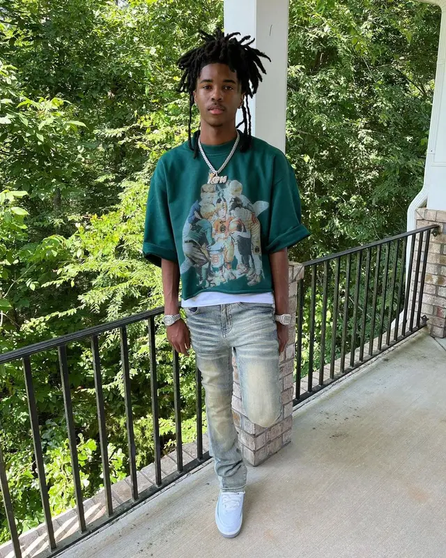 Lil Darius outfit in Polo Ralph Lauren, Tulones, and Jordan, 2023