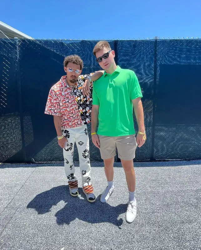 Trae Young outfit in Prada, Denim Tears, and Lanvin, 2023