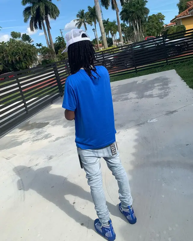 Slatt Zy outfit in Amiri, Ksubi, and Dior, 2022