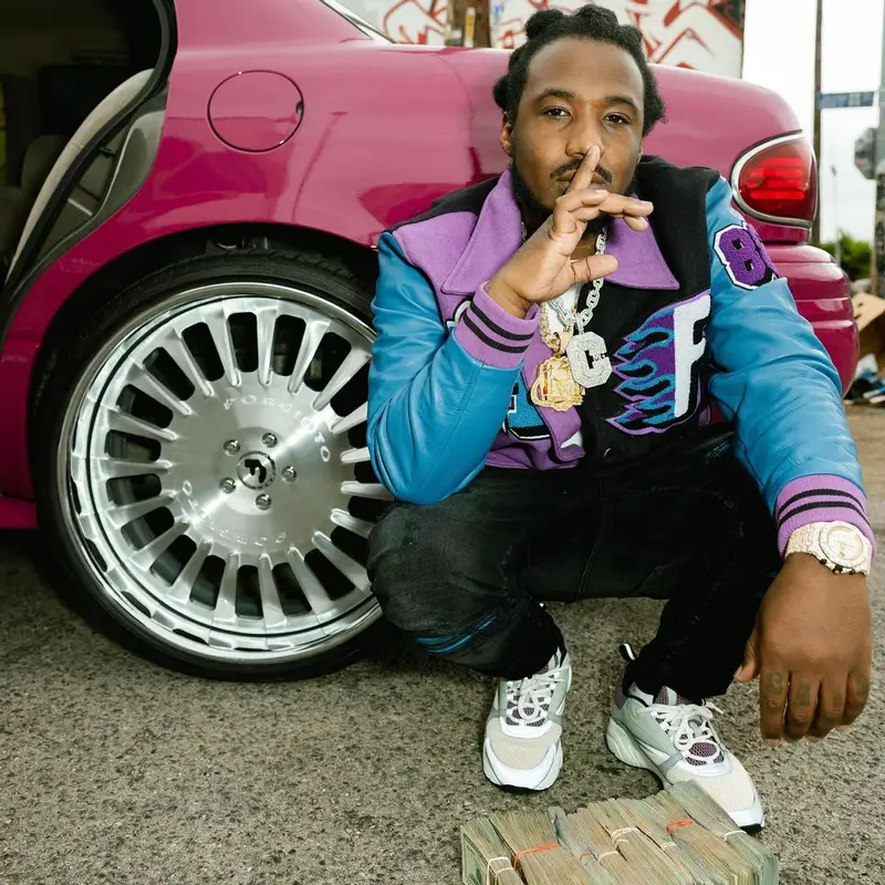 Mozzy outfit in Homme + Femme, Amiri, and Dior, 2023
