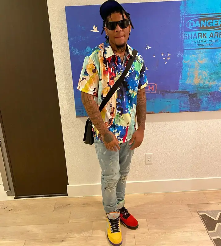 LMB DG outfit in Louis Vuitton, Versace, and Gucci, 2021