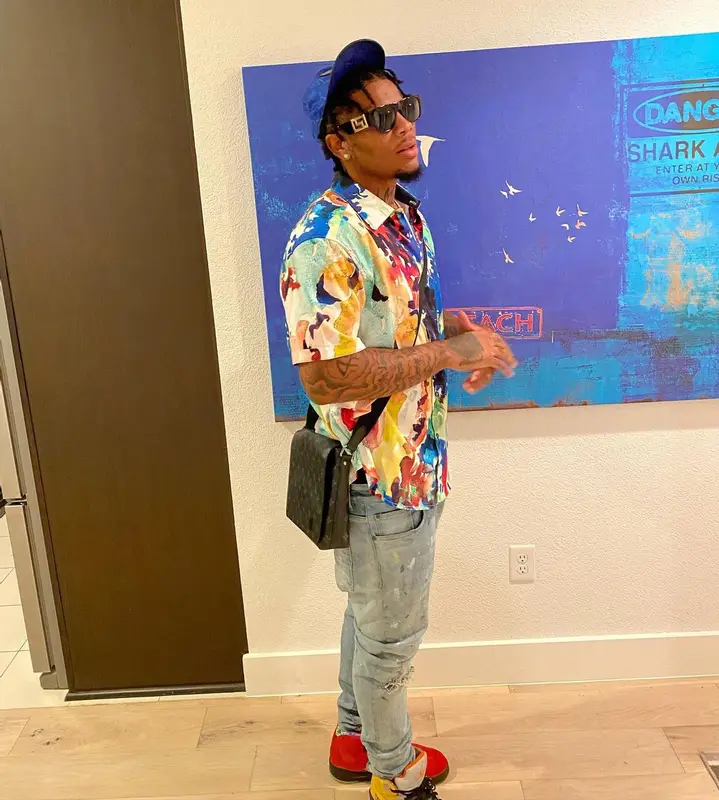 LMB DG outfit in Louis Vuitton, Versace, and Gucci, 2021