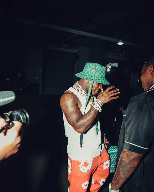 DaBaby outfit in Denim Tears, Goyard, and Gucci, 2023