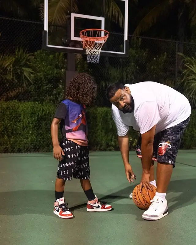 DJ Khaled outfit in Polo Ralph Lauren, Bape, and Mitchell & Ness, 2023