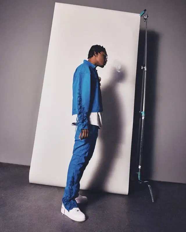 Lil Tjay outfit in BooHooMan, Supreme, and Nike, 2023