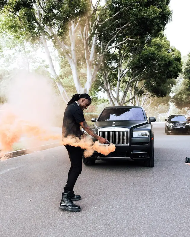 Polo G outfit in Louis Vuitton and Amiri, 2023