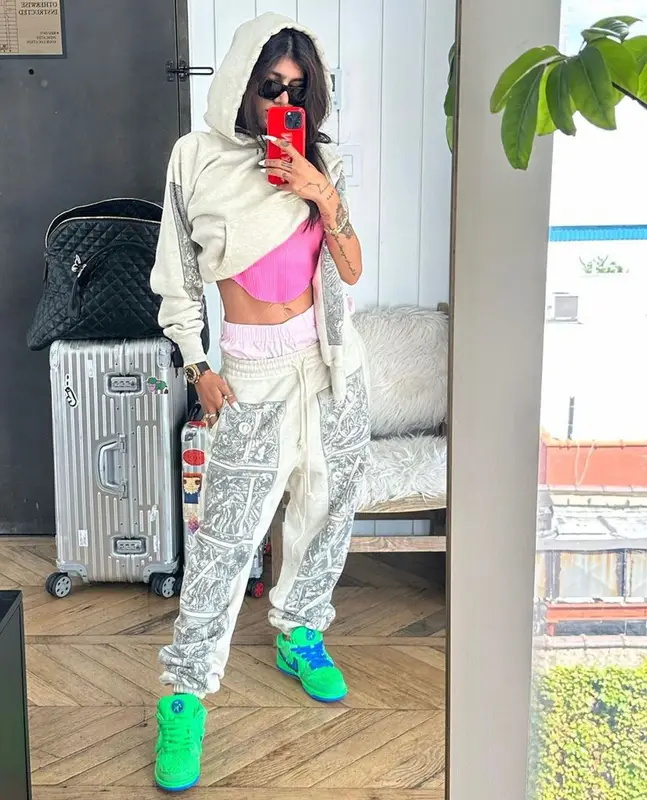 Mia Khalifa outfit in Denim Tears, Nike, and Saint Michael, 2023