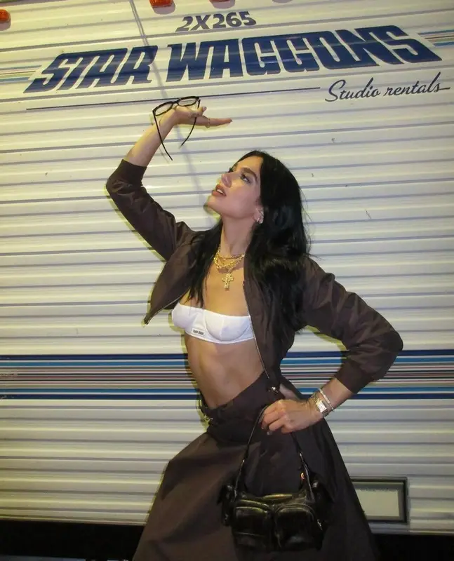 Dua Lipa outfit in Miu Miu and Cartier, 2023