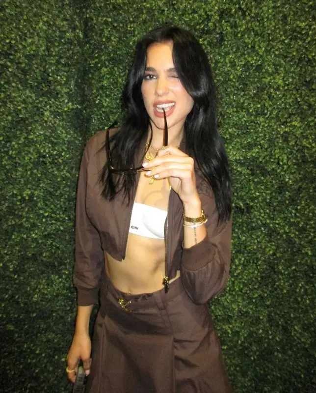 Dua Lipa outfit in Miu Miu and Cartier, 2023