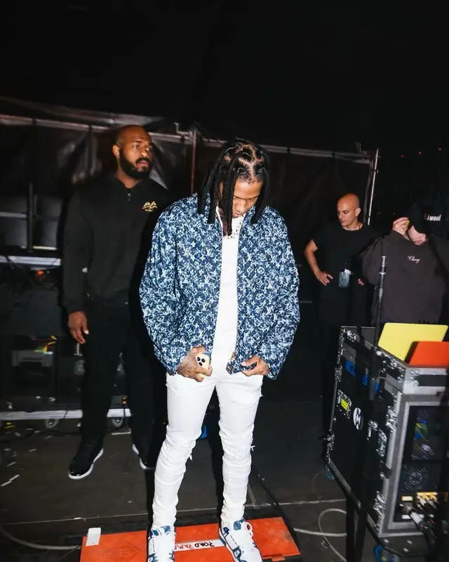 Lil Durk outfit in Louis Vuitton and Amiri, 2023