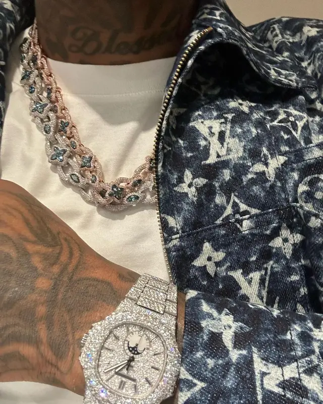 Lil Durk outfit in Louis Vuitton and Amiri, 2023