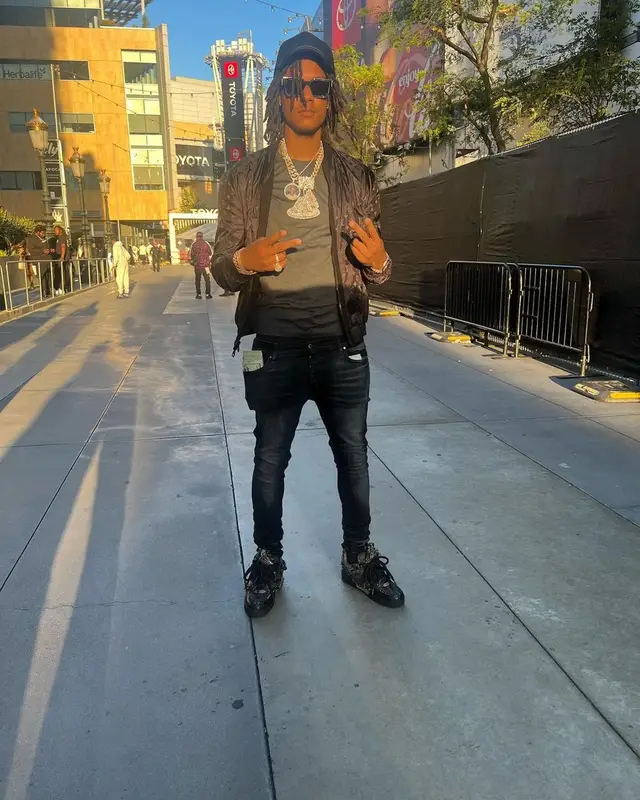 Skilla Baby outfit in Amiri and Louis Vuitton, 2023