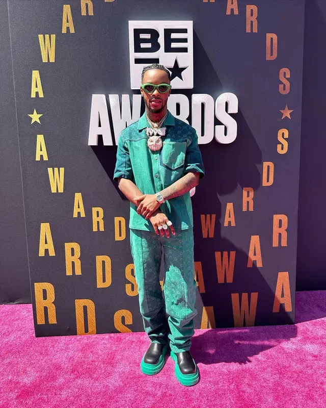 Toosii outfit in Marine Serre and Bottega Veneta, 2023