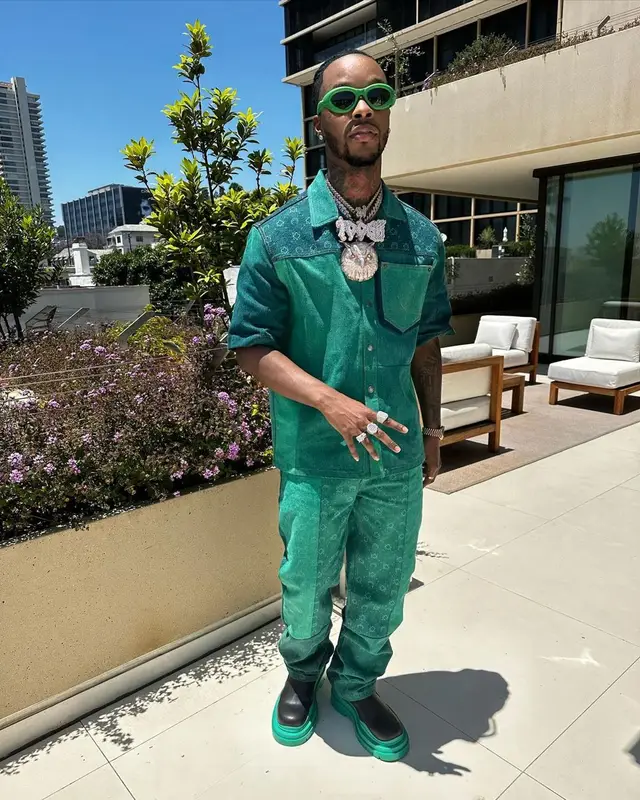 Toosii outfit in Marine Serre and Bottega Veneta, 2023