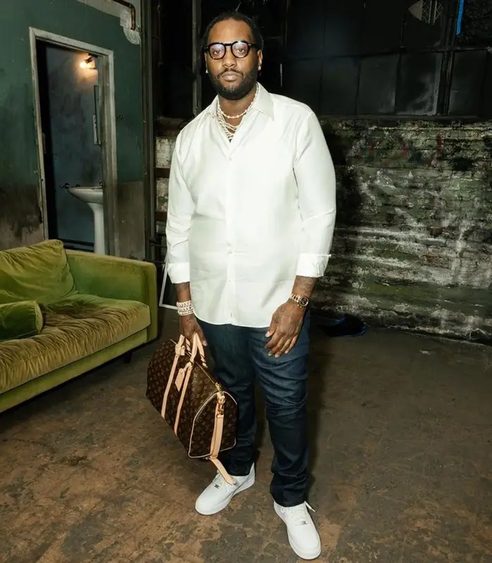 Peezy outfit in Louis Vuitton, Nike, and Tom Ford, 2023